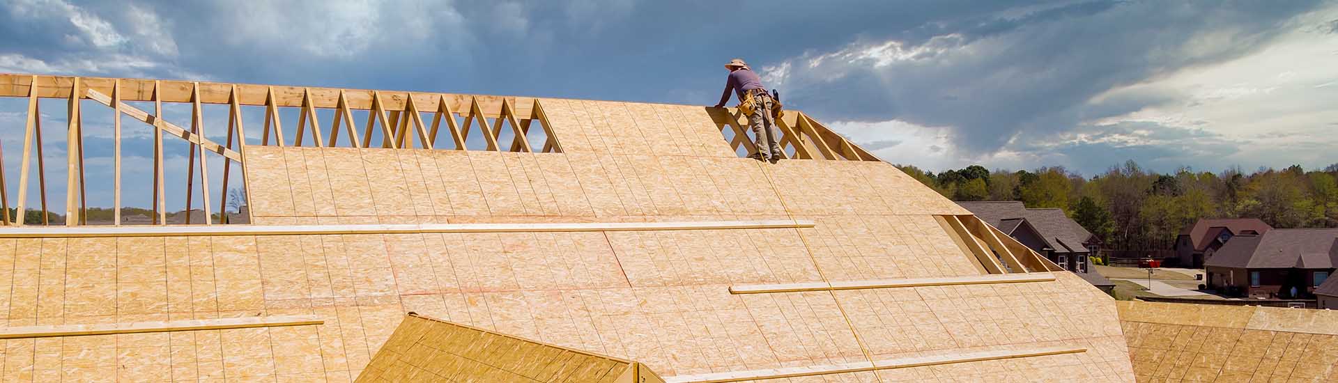 Roof installation on a home in Southern Oregon during dry summer weather